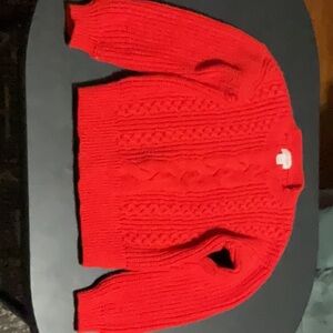 A red children’s CAT & JACK sweater S(6/7)